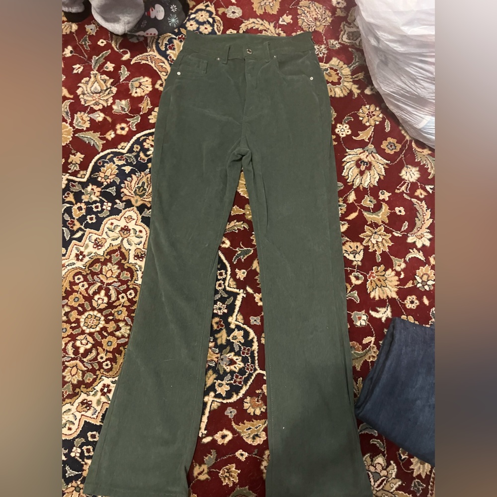 Flared green jeans